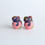 玩具ロードワークス　玉乗りシーサー／桃 - うん(閉口)