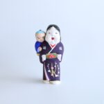 津屋崎人形　福助背負いお多福